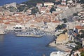 Aerial view of Old Town (Stari Grad), city walls and a port for tourist ships by Adriatic Sea, Dubrovnik, Croatia